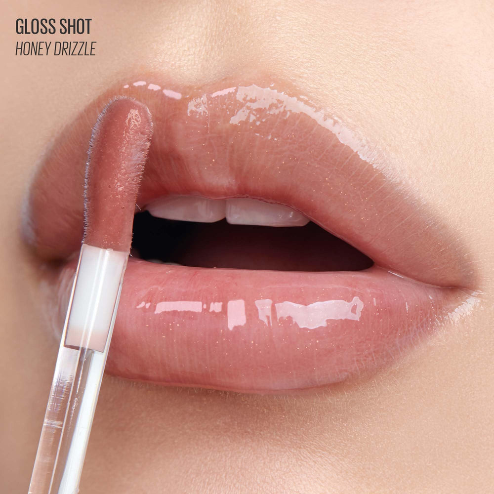 Kaja Gloss Shot 03 Honey Drizzle swatch reveals sheer, pearly plump-looking gloss.