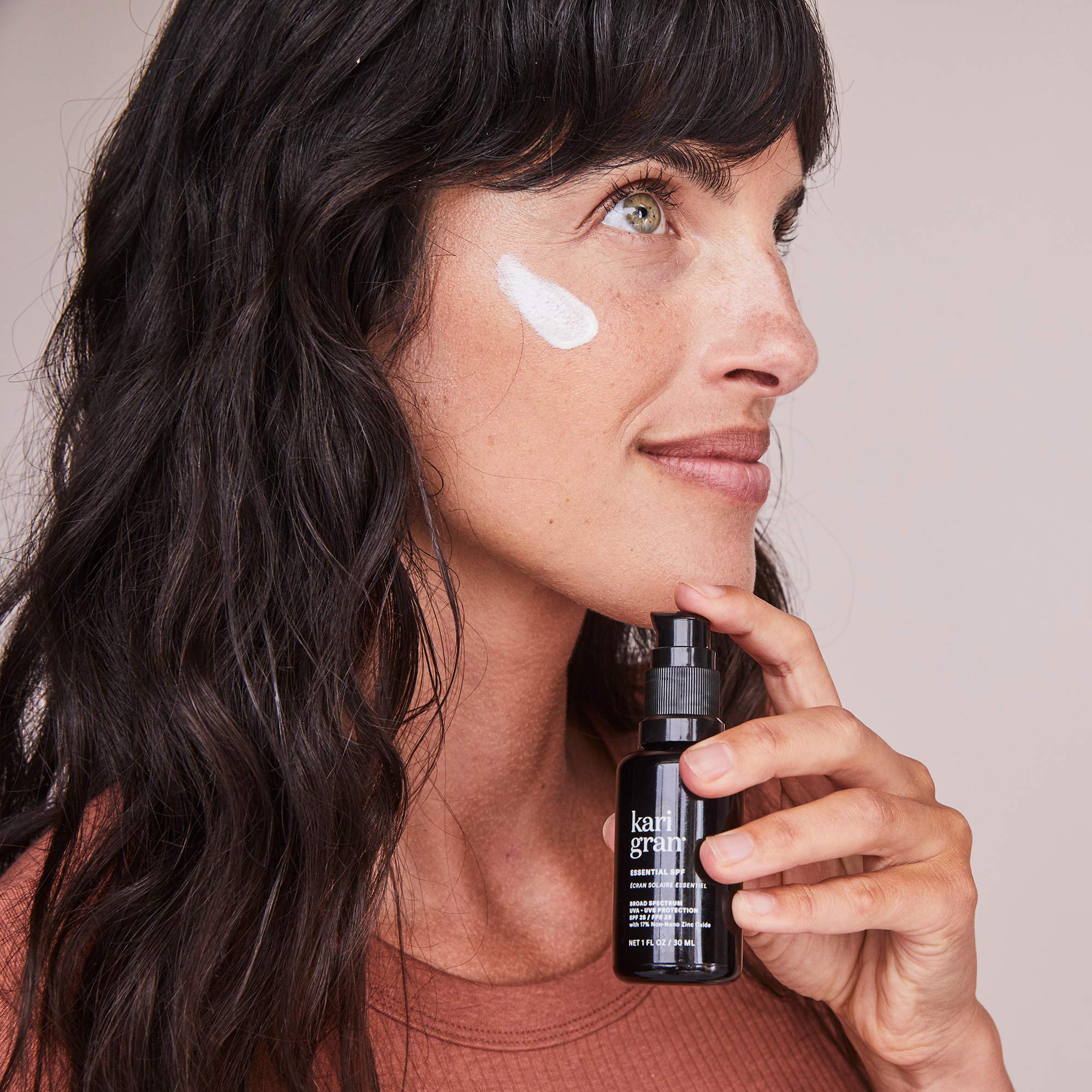 Morning skincare ritual with Kari Gran SPF 30 for daily protection.