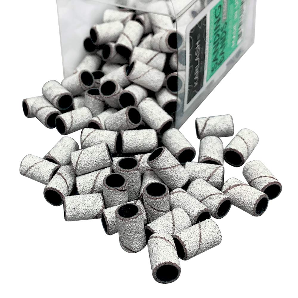 Karlash zebra medium-grit sanding bands in use for precise nail art prep.