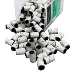 Karlash zebra medium-grit sanding bands in use for precise nail art prep.
