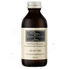 Karma Organic Nail Polish Remover Unscented bottle closeup for gentle acetone-free polish removal.