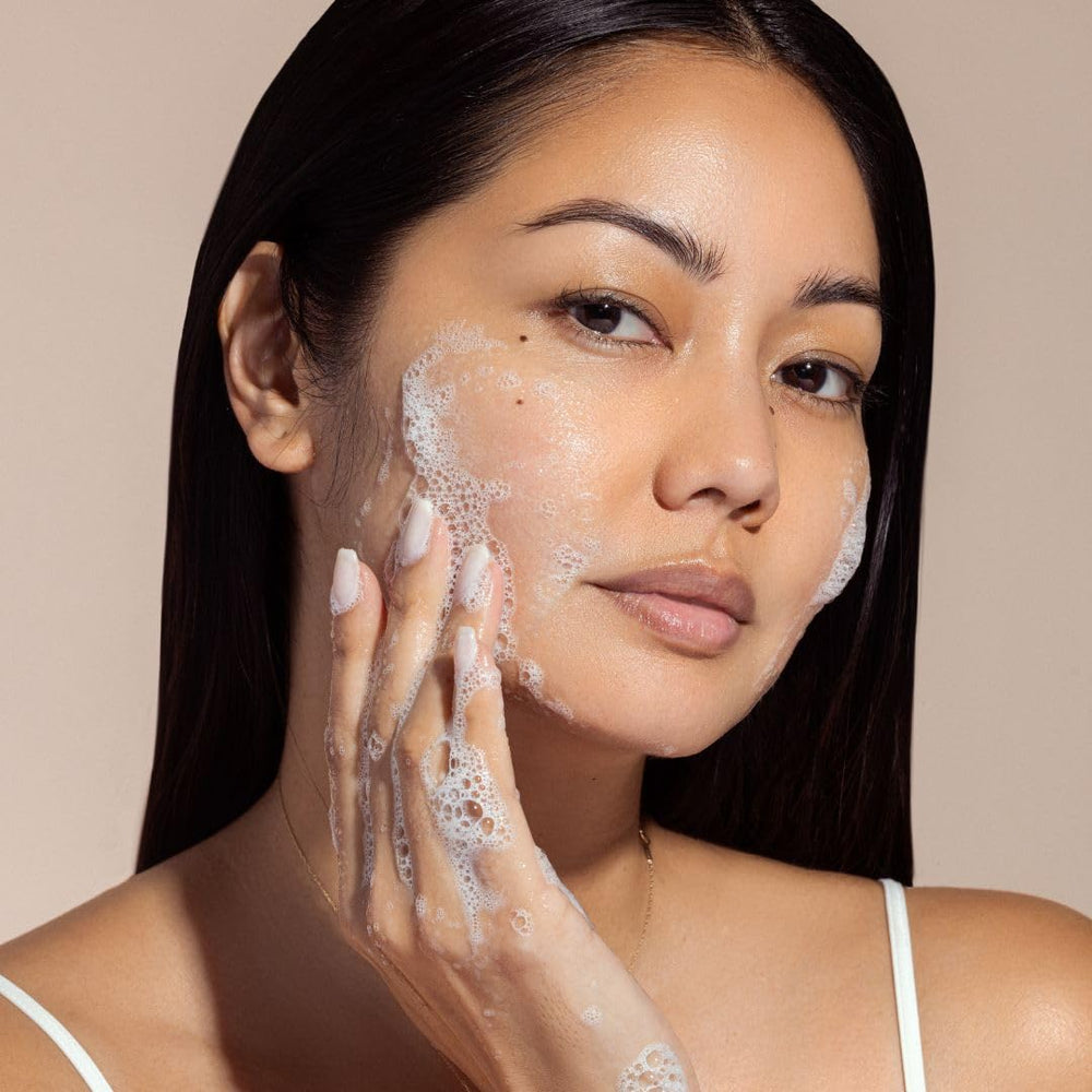 Karuna Balancing Facial Gel Cleanser hyaluronic acid droplets highlight hydration.