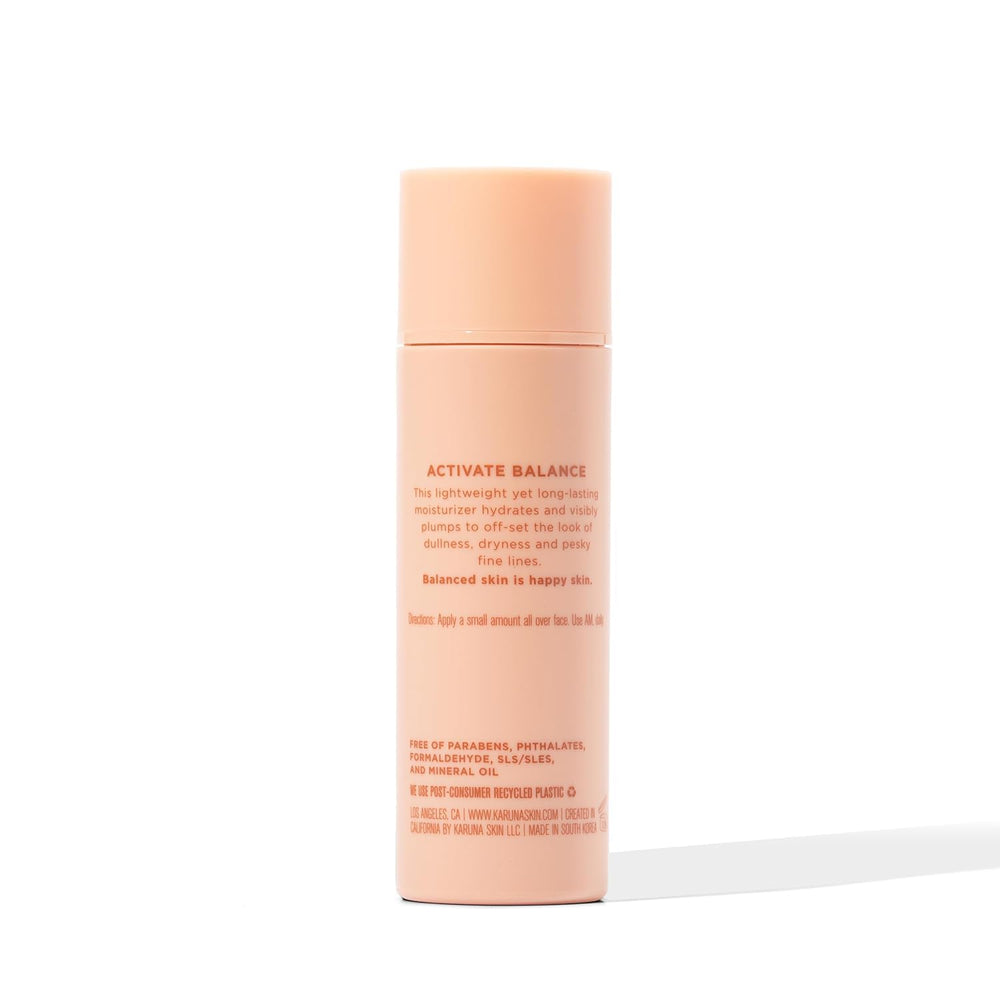 Side view of Karuna product packaging with soft lighting