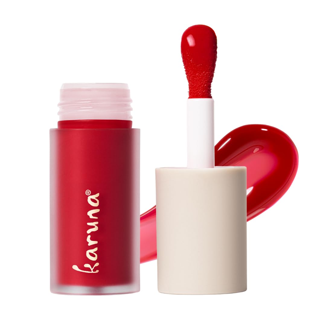 Karuna Skin Tinted Lip Oil Embrace tube close-up; hydrating color with lightweight finish.