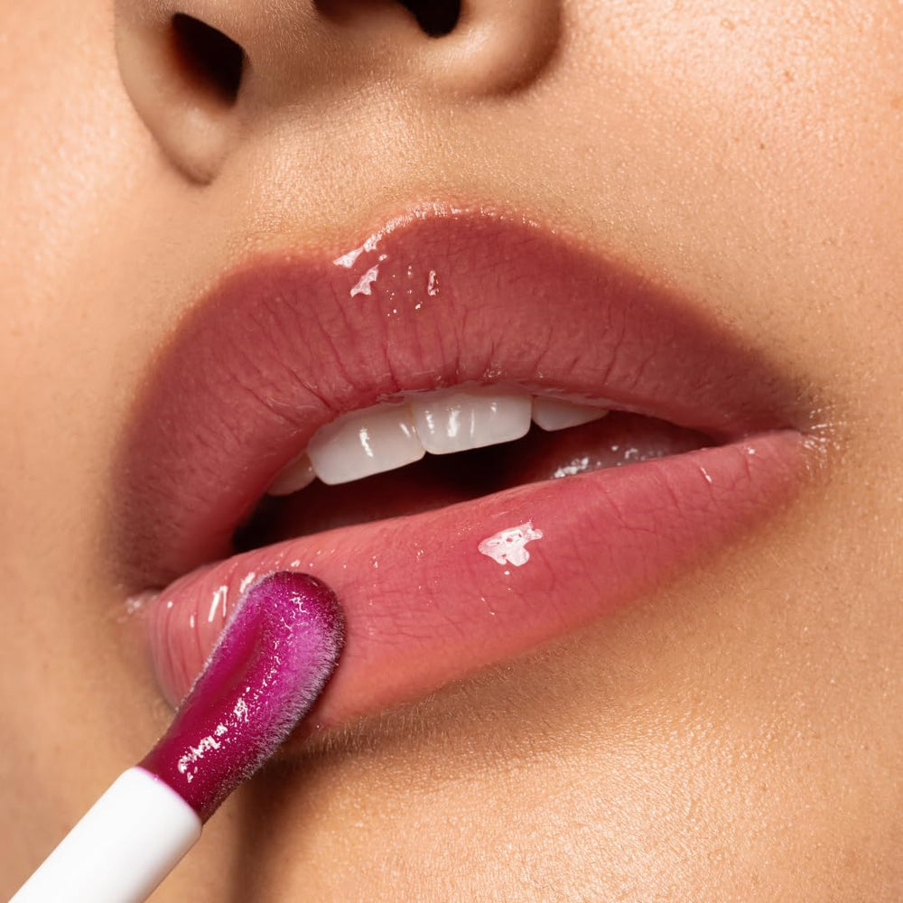 Karuna Skin Tinted Lip Oil Grow swatch on lips for balanced color