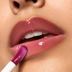 Karuna Skin Tinted Lip Oil Grow swatch on lips for balanced color