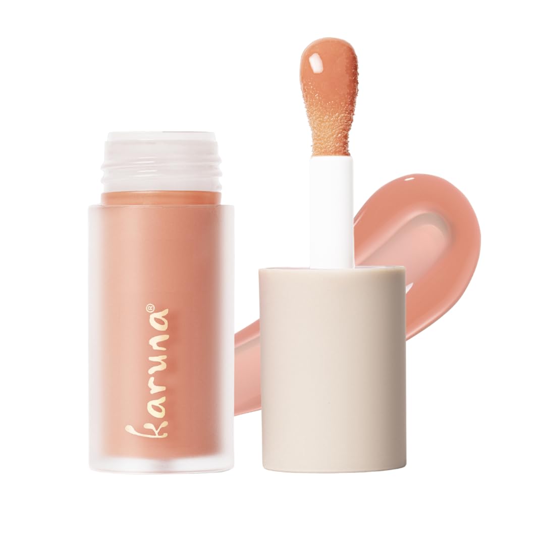 Karuna Skin Soar tinted lip oil on primary shot delivers hydrating color.