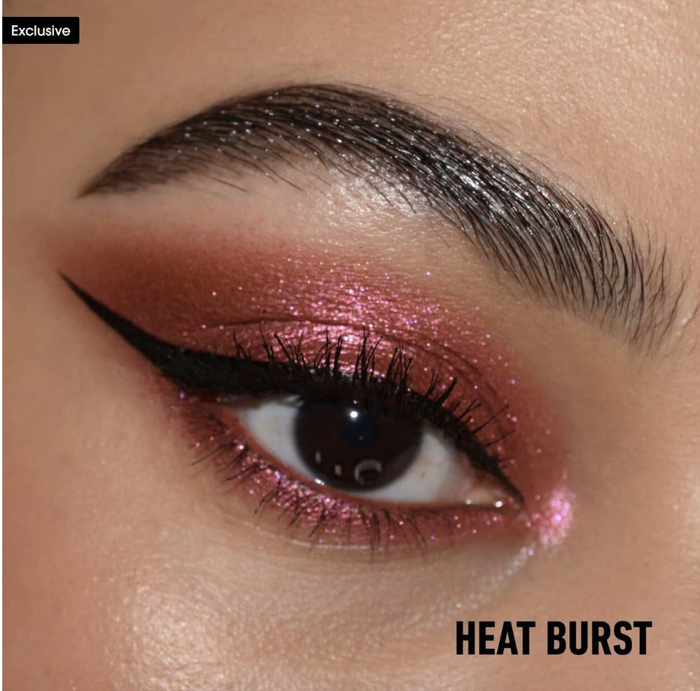 Kat Von D Dazzle Heat Burst cap twist reveals portable vegan long-wear design.