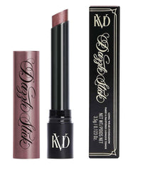 Kat Von D Dazzle Heat Burst swatch on skin shows bold vegan ruby shade for vibrant lids.