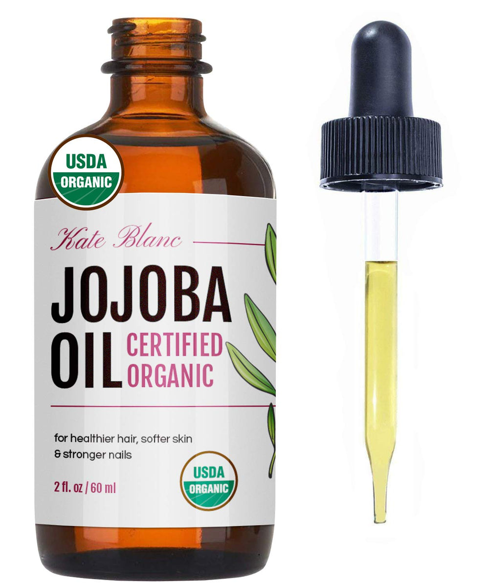 Kate Blanc Jojoba Oil bottle pour for hair shine and skin hydration.