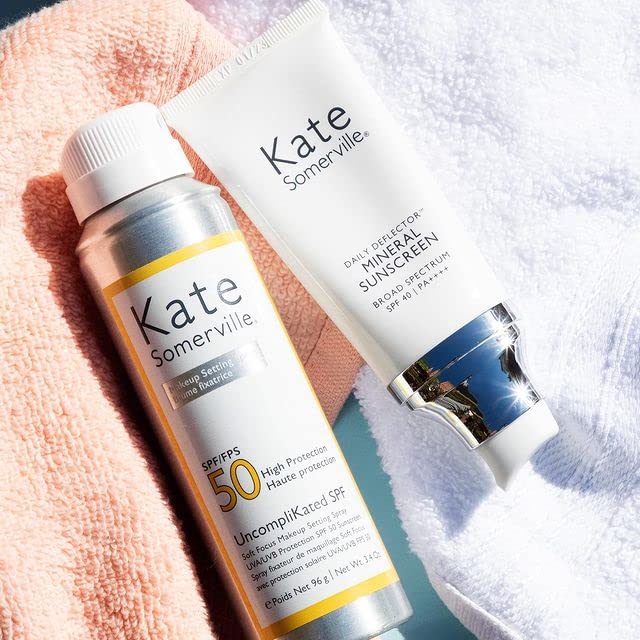 Product label highlights SPF 50 and makeup setting benefits.