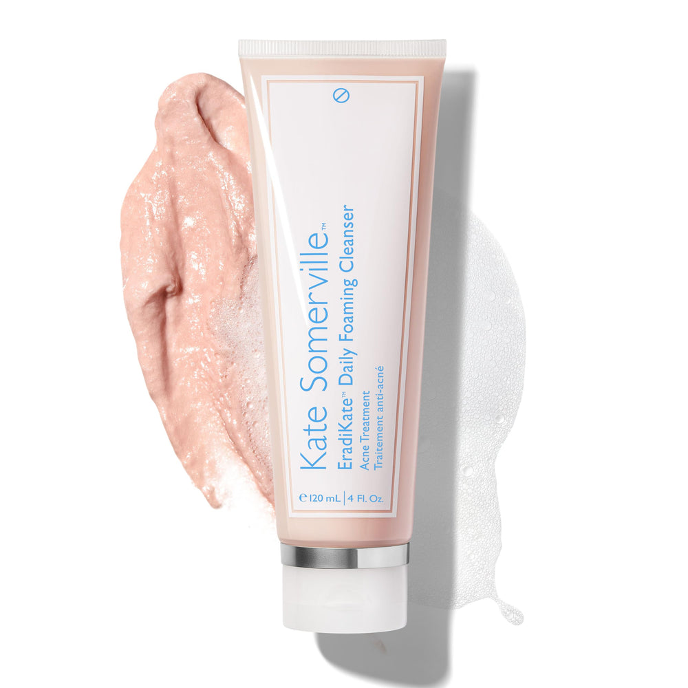 Kate Somerville EradiKate 3% Sulfur cleanser bottle in focus, medicated formula for clearer pores.