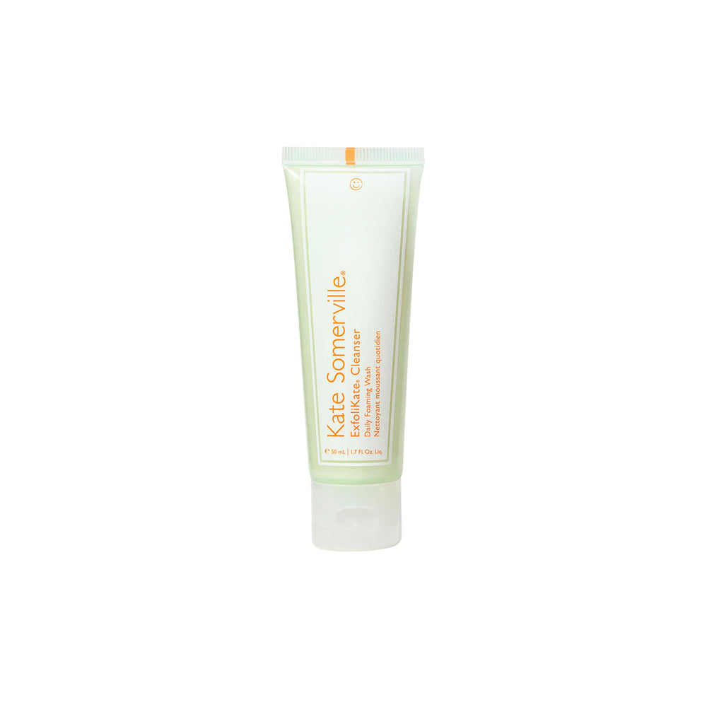 Exfoliating scrub texture close-up demonstrates smoothing action.