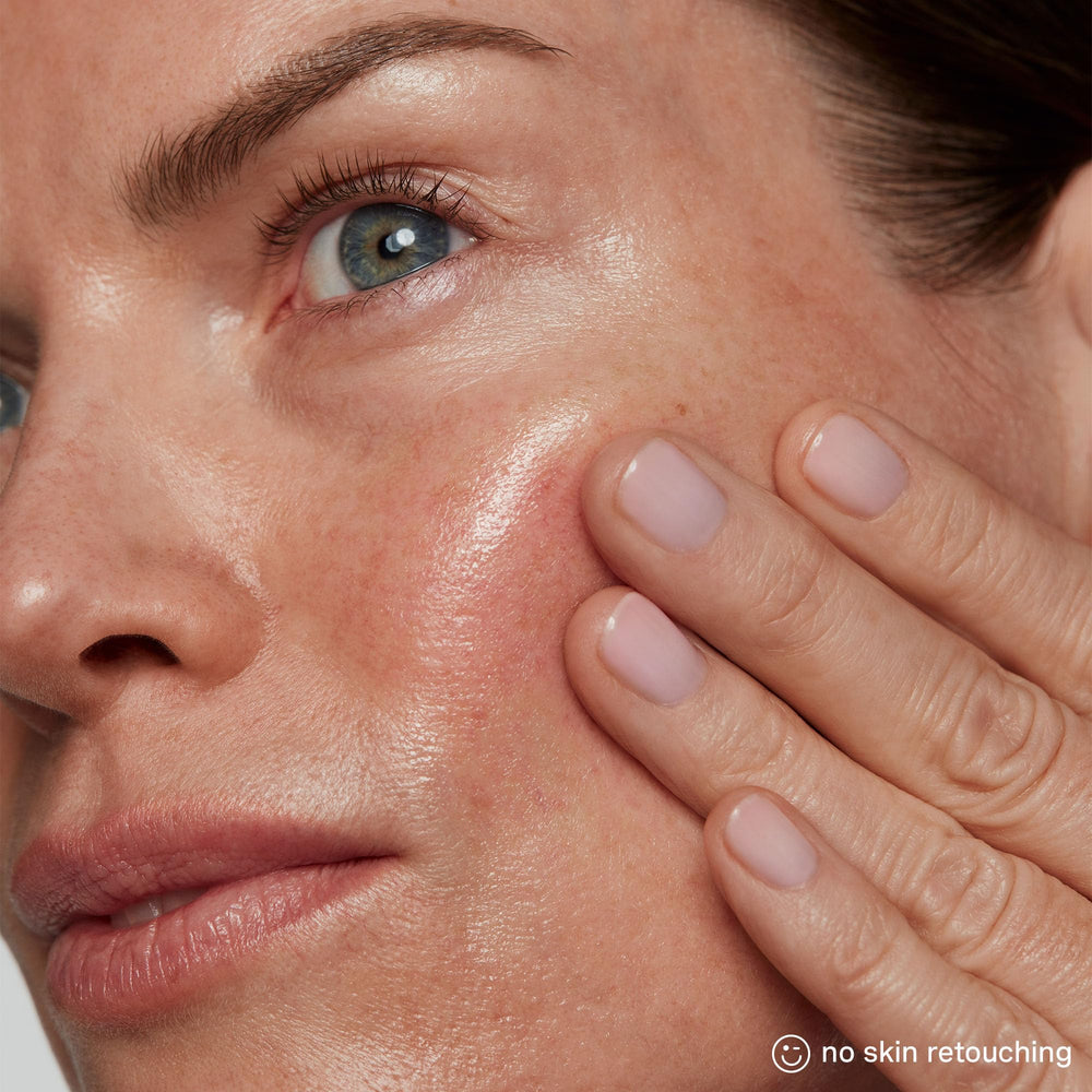 Kate Somerville SuperCell Serum swirled on the hand for quick absorption.