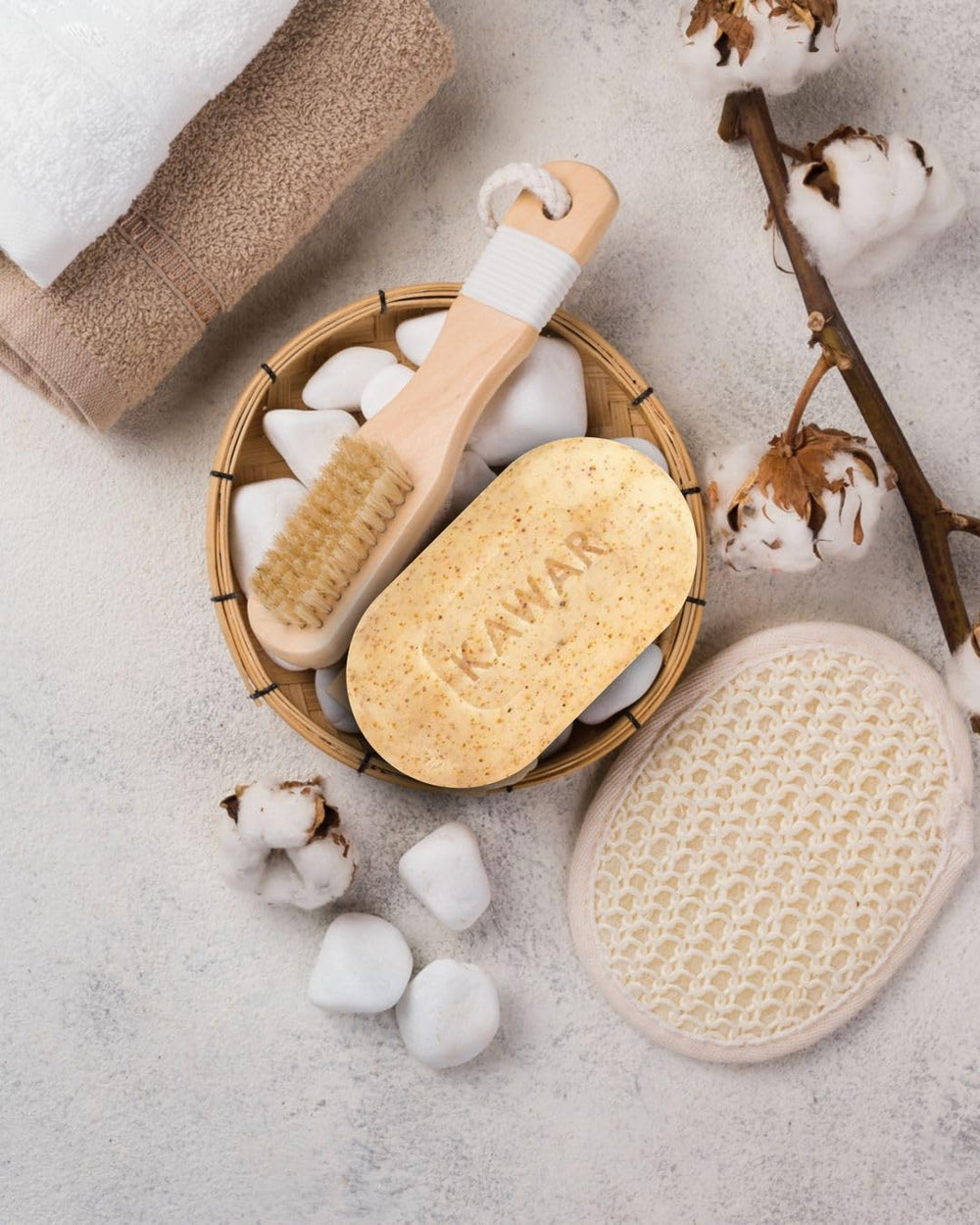 KAWAR exfoliating bar in bathroom setting suggests daily refresh.