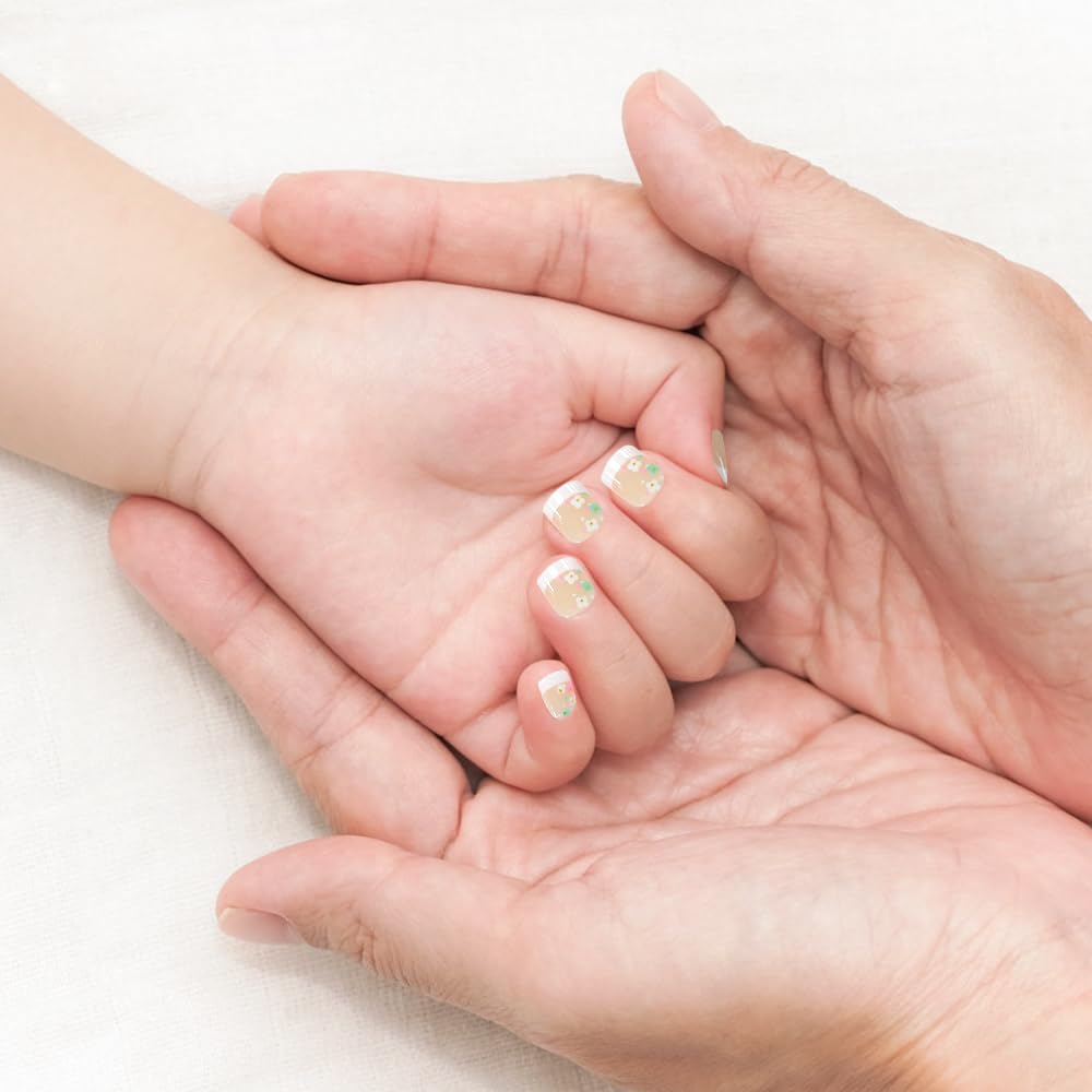 Kawyehu Kids Press-On Nails with pre-applied adhesive tabs for mess-free fitting.