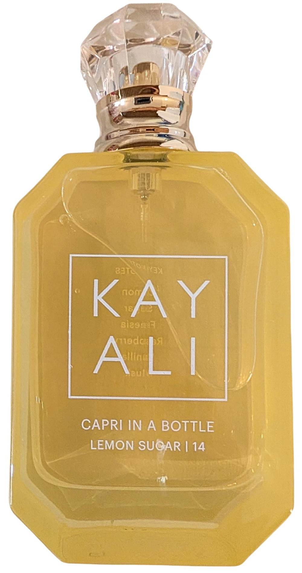 Kayali Capri in a Bottle Lemon Sugar 14 floral-heart conveys soft sweetness for date nights.