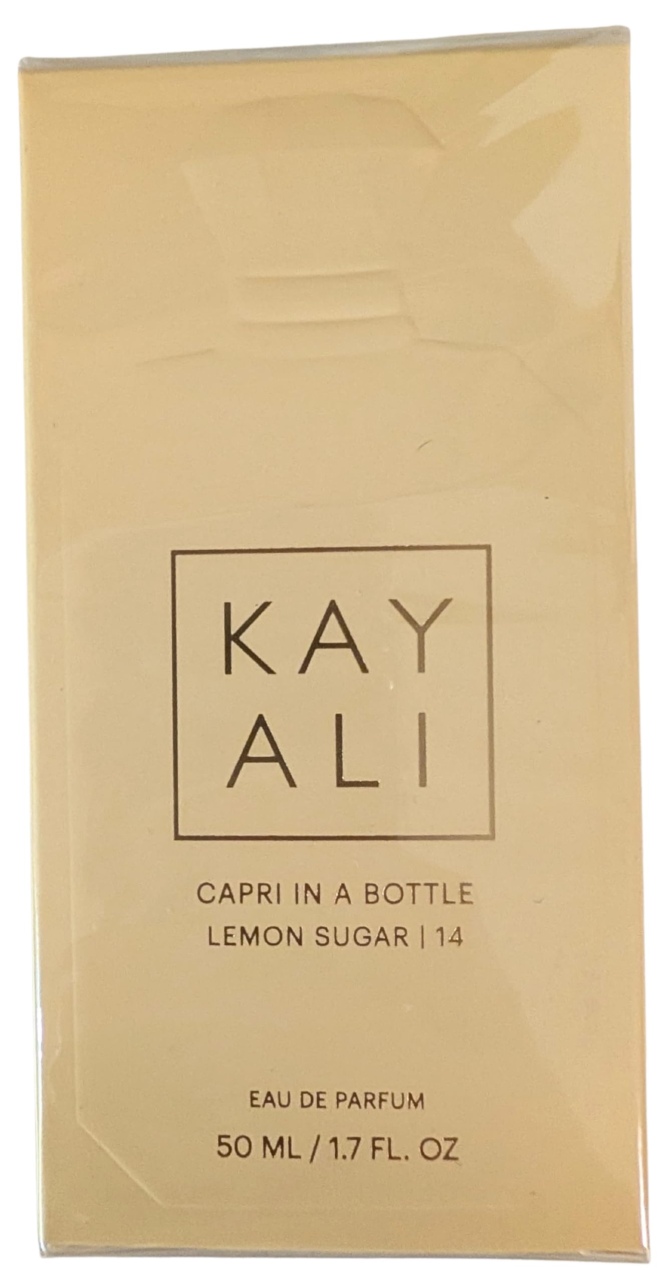Kayali Capri in a Bottle Lemon Sugar 14 vanilla-base adds warmth for all-day wear.