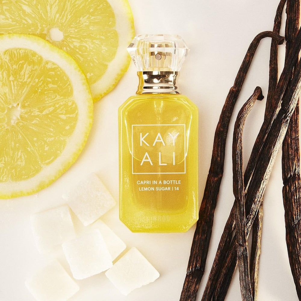 Kayali Capri Lemon Sugar bottle held in hand for everyday ease.