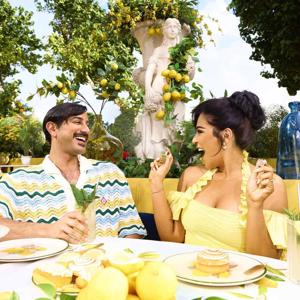 Kayali Capri Lemon Sugar lifestyle shot with citrus brightness and cozy vibes.