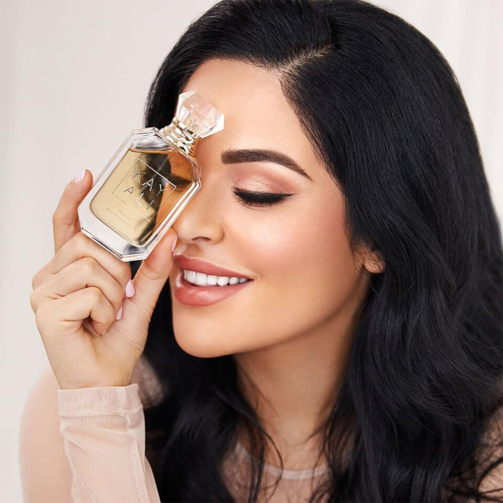 Kayali Deja Vu White Flower 57 cap detail highlighting elegant luxury