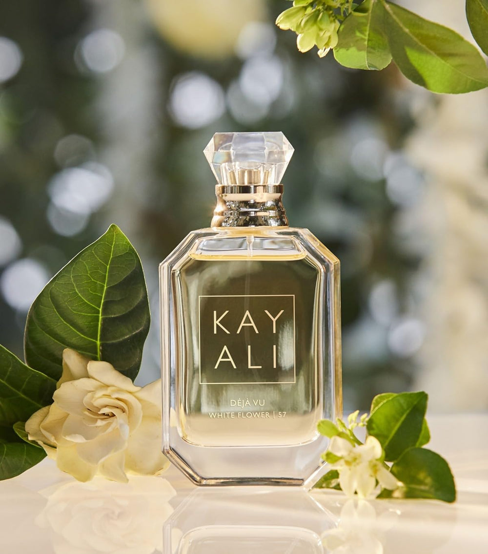 Kayali Deja Vu White Flower 57 logo close-up showing brand prestige