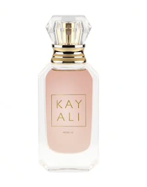 Kayali Huda Beauty Musk 12 bottle front view highlights warm florals and elegant design.