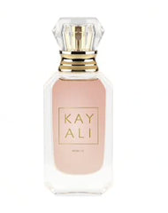 Kayali Huda Beauty Musk 12 bottle front view highlights warm florals and elegant design.