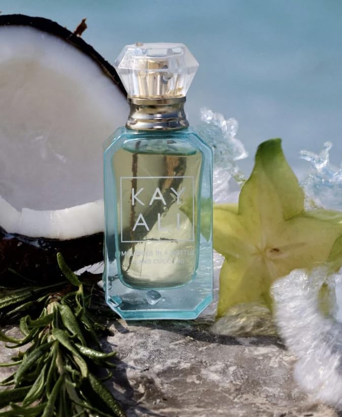Close-up of the Kayali Maldives mini EDP cap, emphasizing portability and luxury.