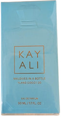 Kayali Maldives Ylang Coco bottle on shelf, evokes a tropical mood and ocean-inspired vibe.