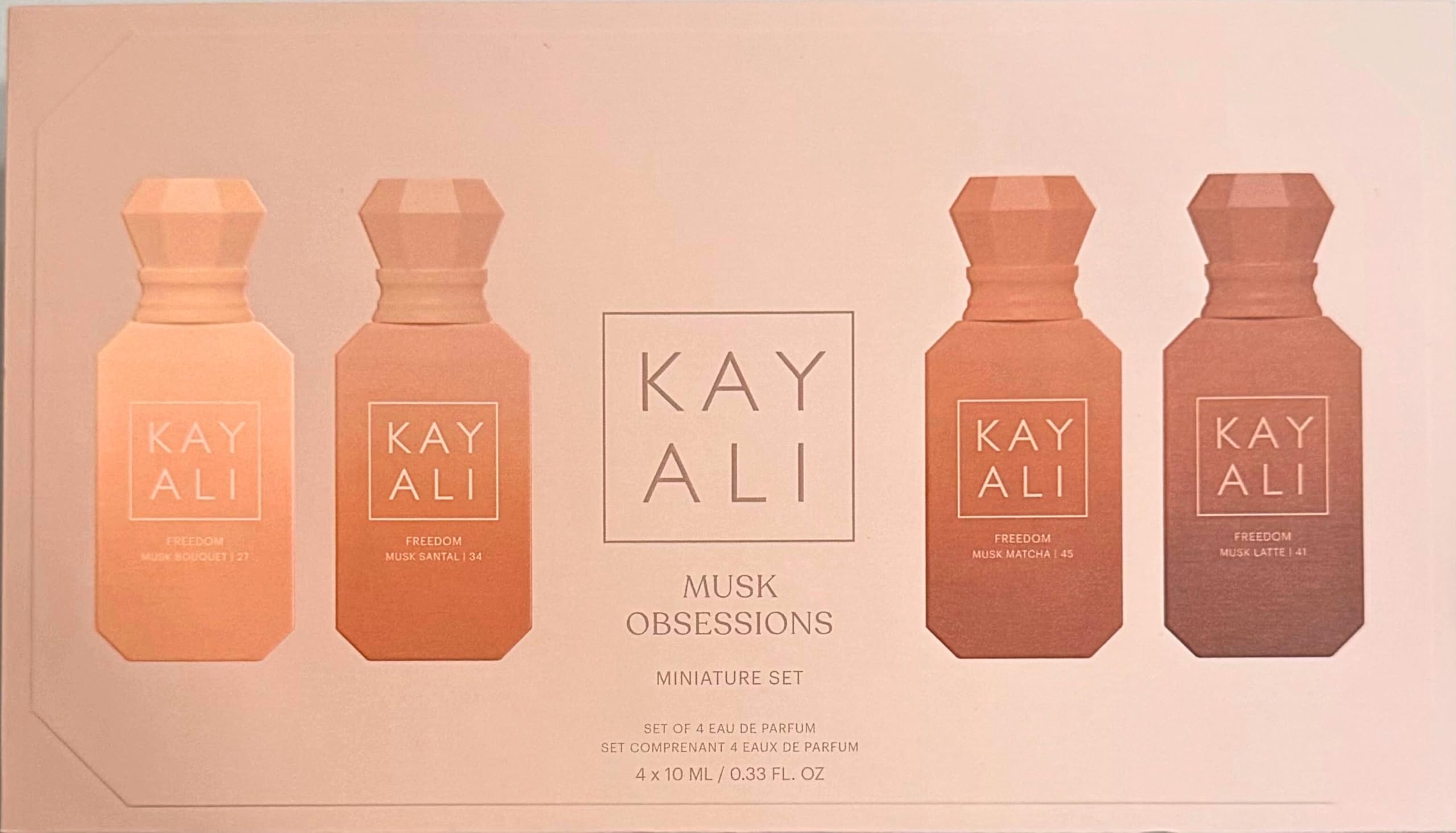 Kayali Musk Obsessions mini set packaging shows four travel-size bottles for easy layering.