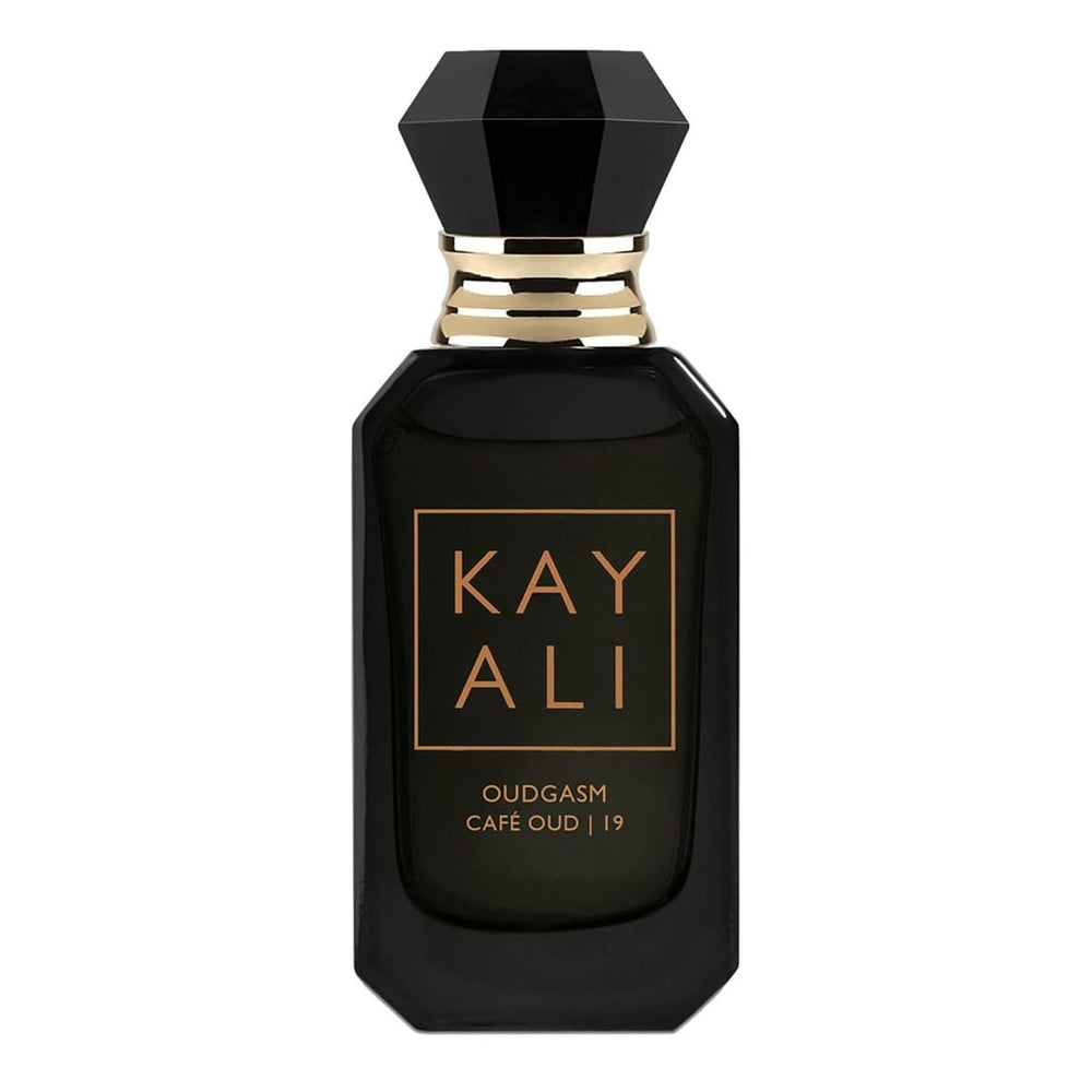 Kayali Oudgasm Café Oud travel spray bottle ready for on-the-go fragrance