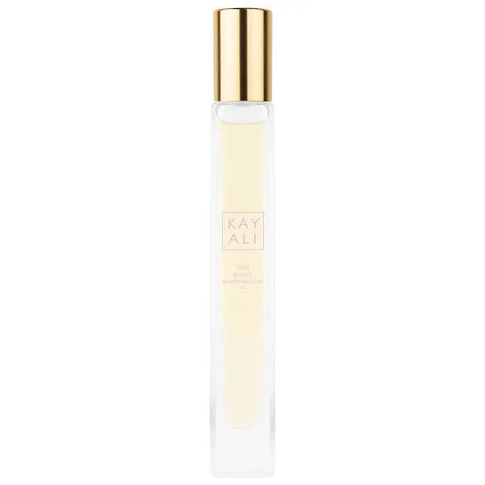 KAYALI Yum Boujee Marshmallow 81 travel spray bottle for on-the-go luxury fragrance.