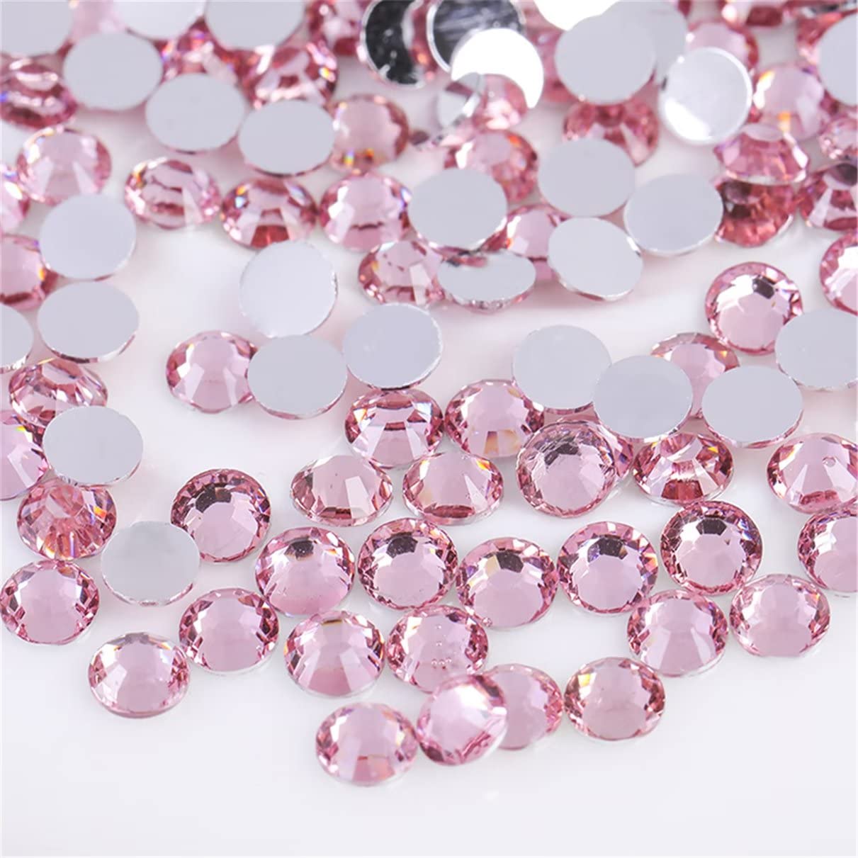 Kdkyy light pink SS12 flatback rhinestones close-up showing precise facets for radiant nail art