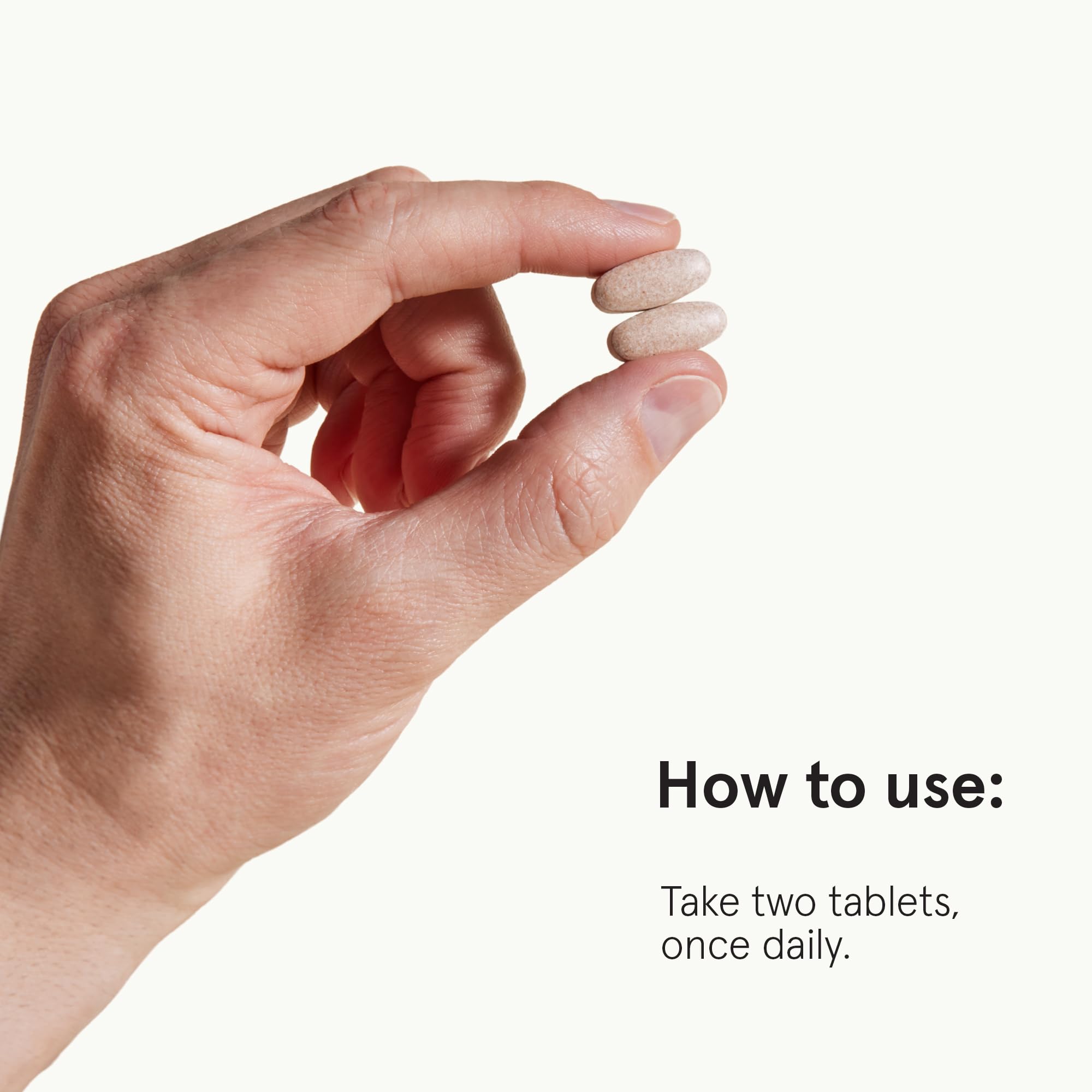 Keeps bottle shown with a glass of water demonstrating easy two-tablet daily routine.