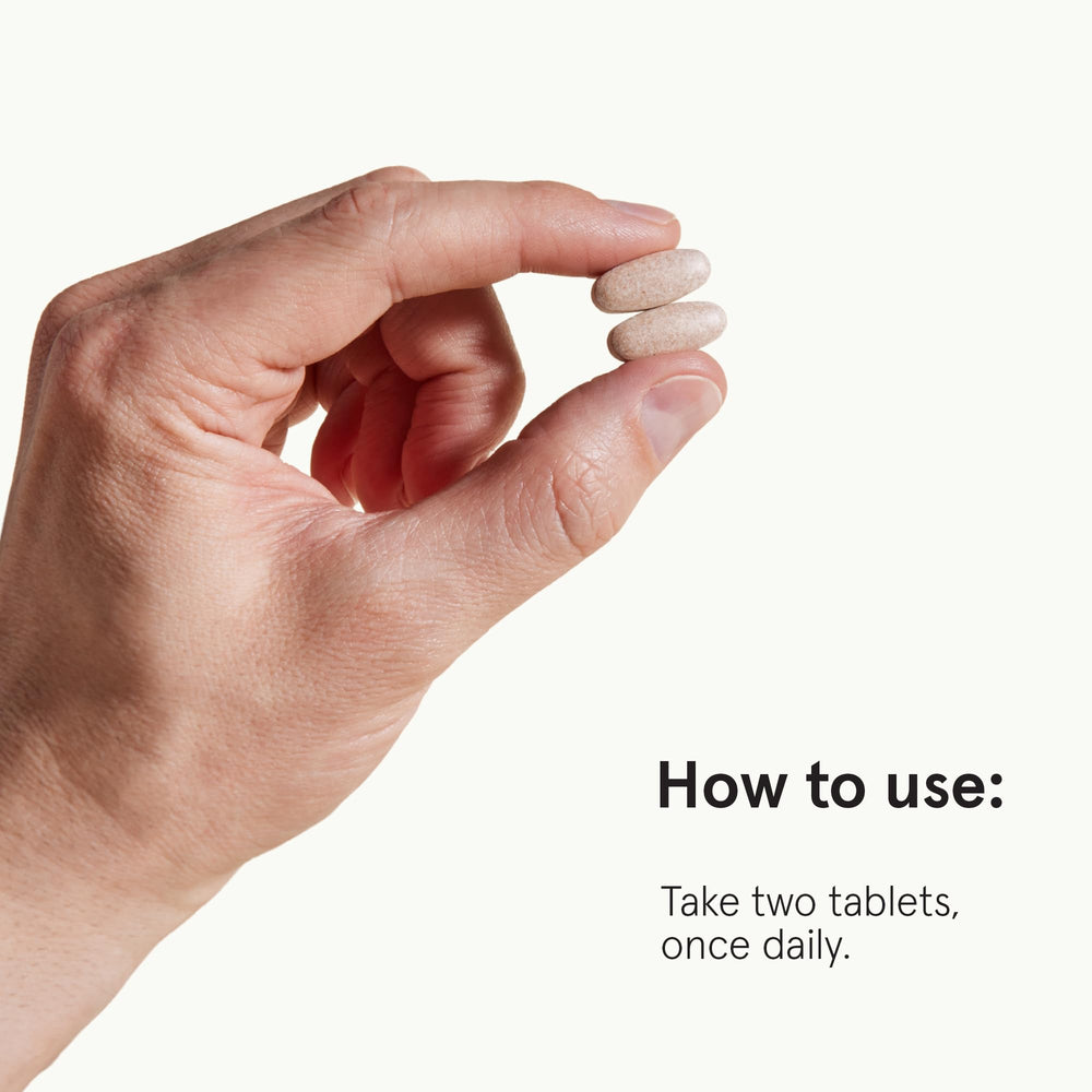 Keeps bottle shown with a glass of water demonstrating easy two-tablet daily routine.