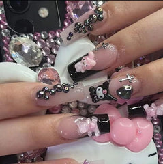 Kelbbo Kitty San-Rio nail charm application using tweezers for easy DIY decorating.
