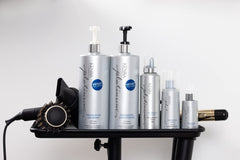 Kenra Platinum Thickening Conditioner closeup demonstrating detangling and body support