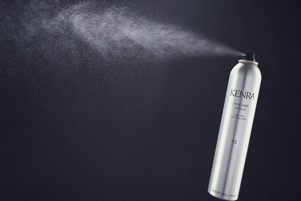 Kenra Volume Spray 25 spraying action showing long-lasting hold against wind
