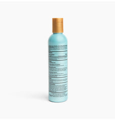 KeraCare ingredients close-up showing flax seed extract and coconut oil for nourishment.