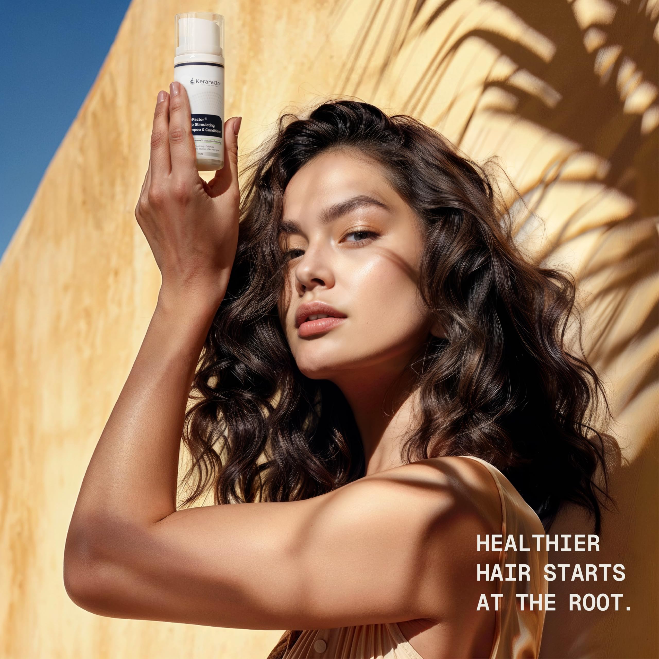 Hands performing scalp massage with KeraFactor for balanced care