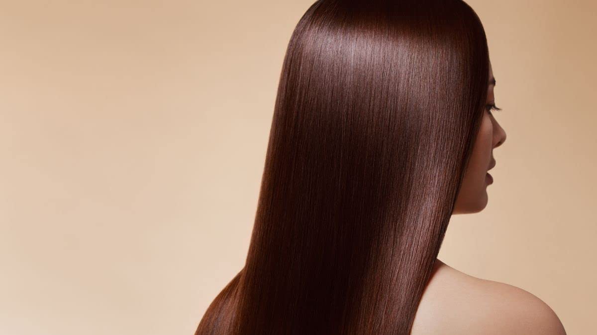 Close-up of hair strands reveals regenerated texture and softness.