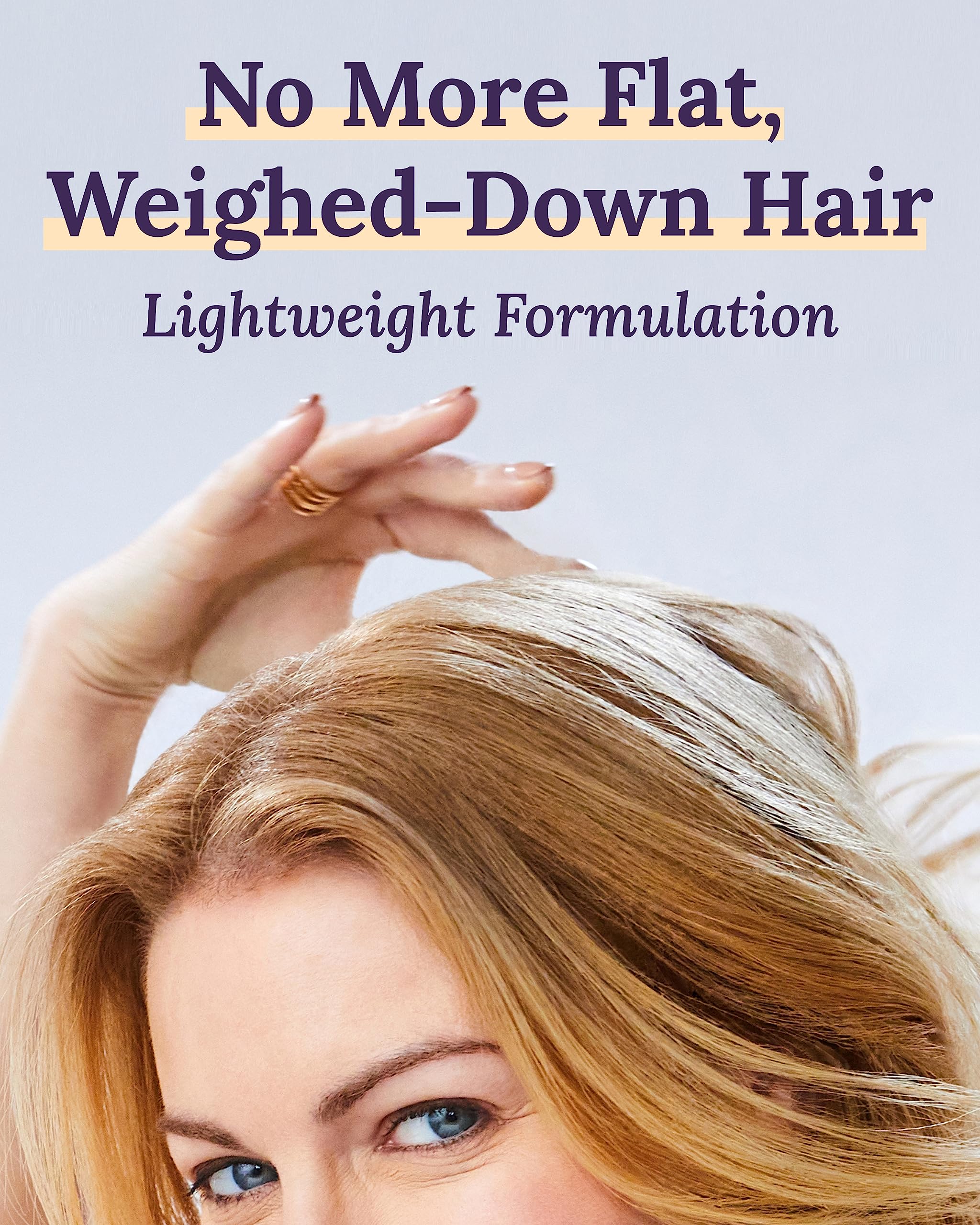 Keranique Volume Shampoo foam shown for refreshing cleansing on hair.