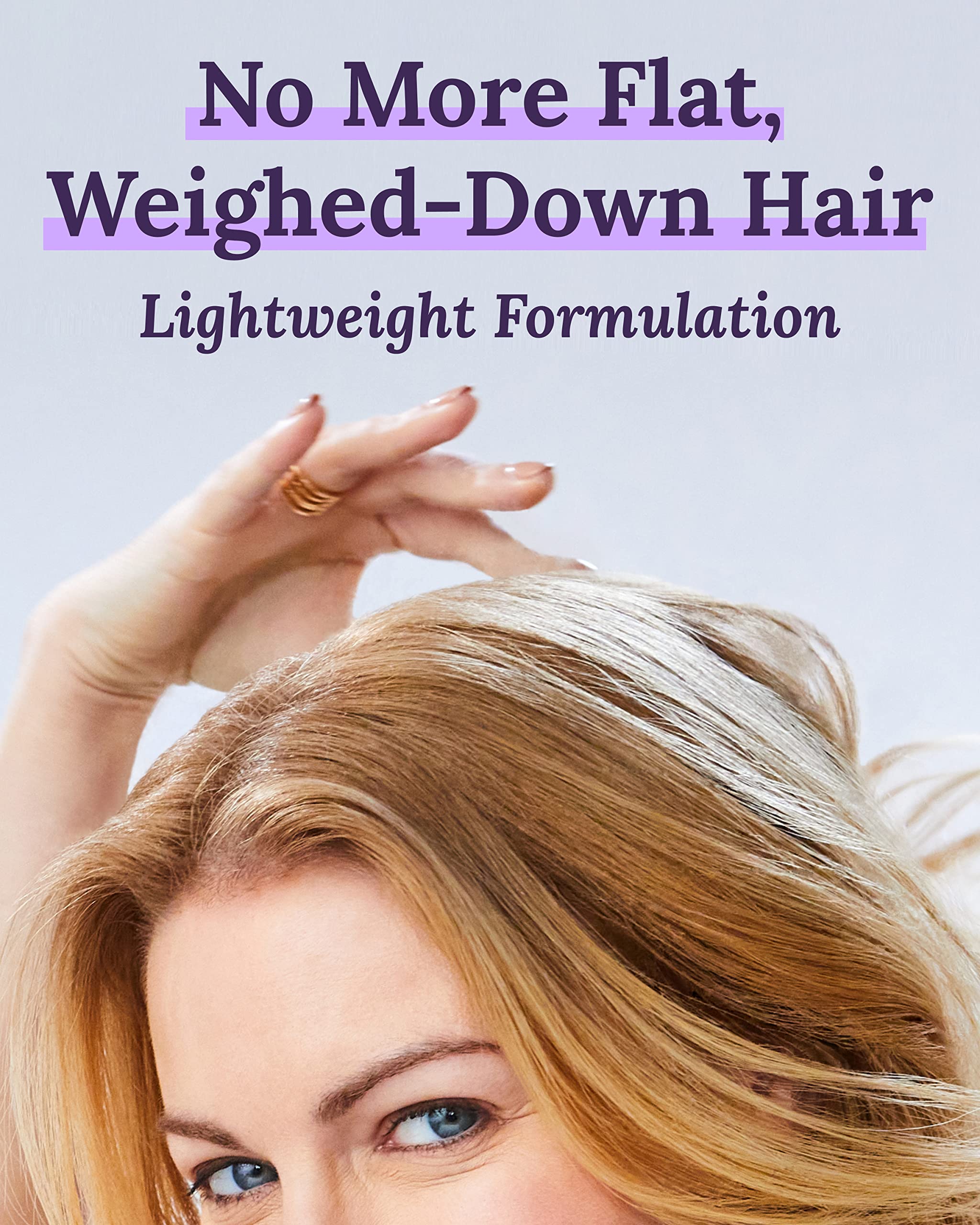 Hands dispensing Keranique Volumizing Mousse for easy, mess-free styling prep.