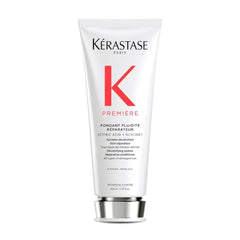 KÉRASTASE Premiere bottle pour showing instant hydration and repair benefits.
