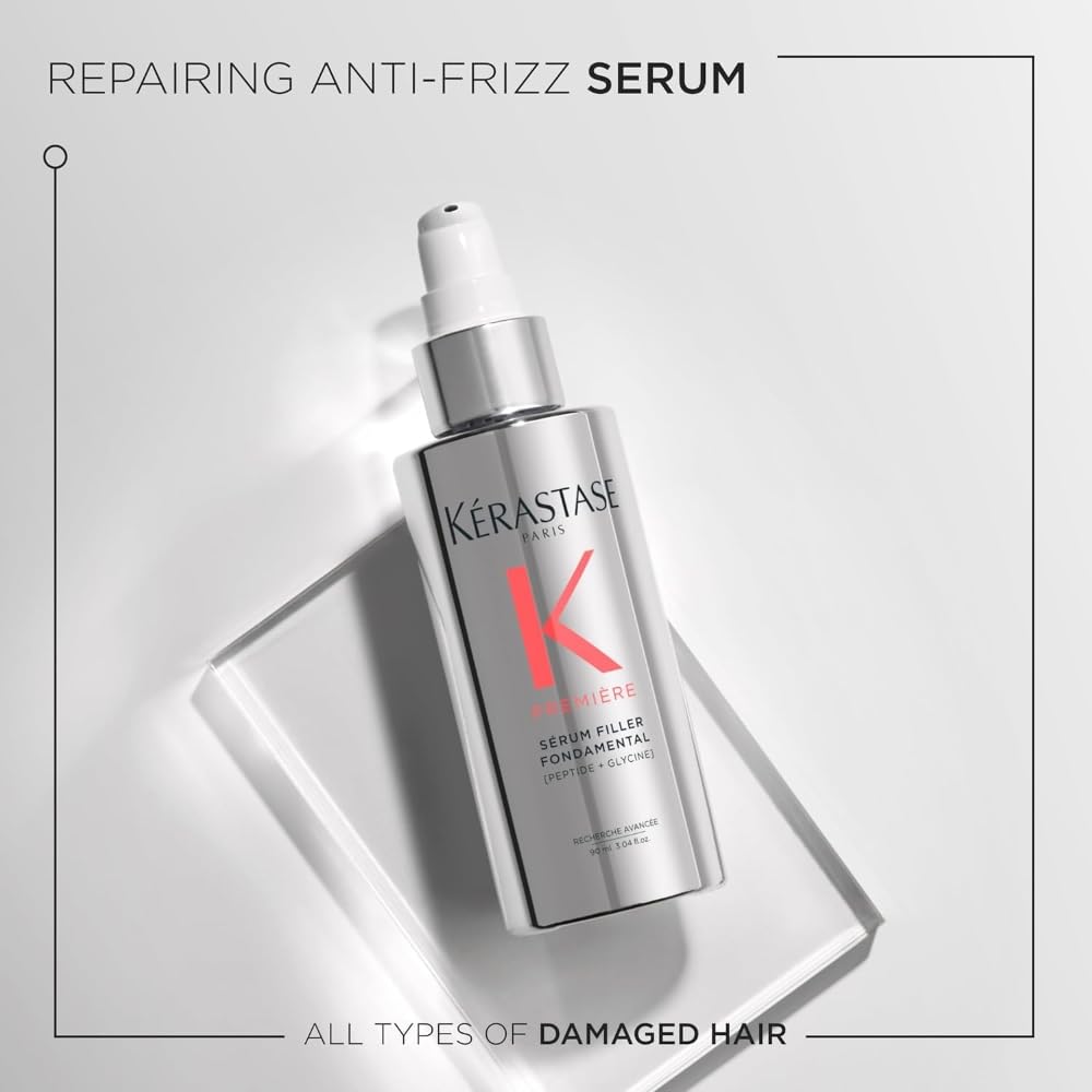 Kerastase Premiere serum on towel-dried hair preparing for styling with heat protection.