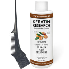 KERATIN RESEARCH bottle and brush for at-home professional keratin treatment.