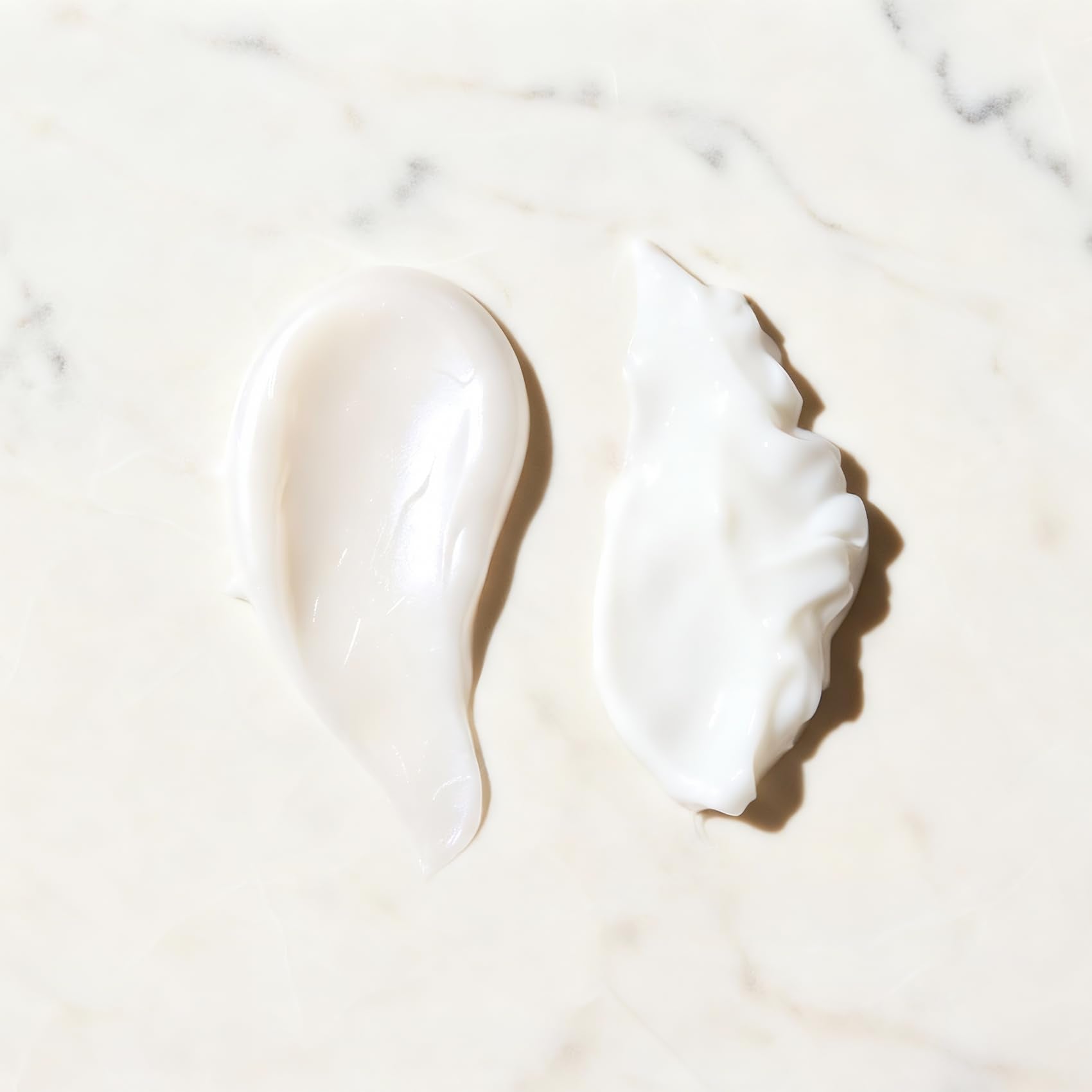 Kevabin shampoo and conditioner duo on bathroom counter for daily use.