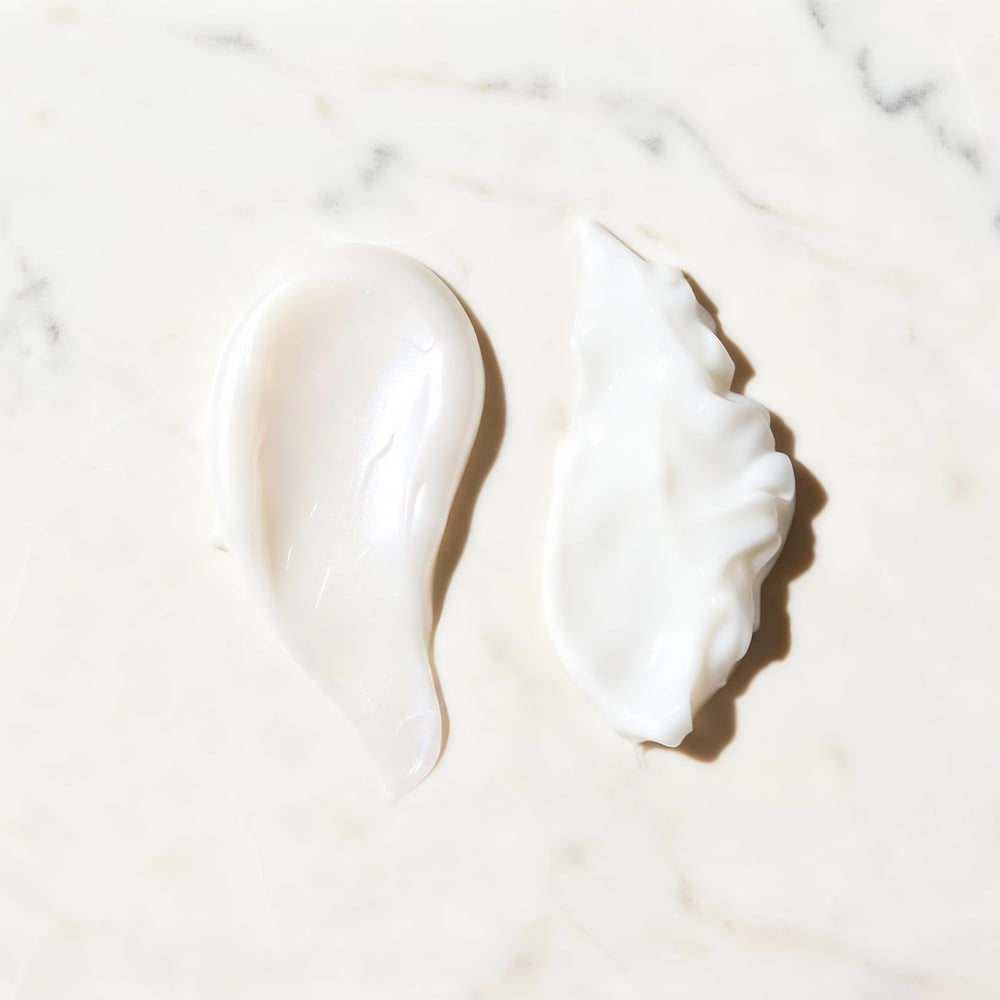 Kevabin shampoo and conditioner duo on bathroom counter for daily use.