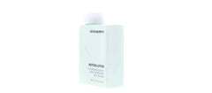 Kevin Murphy Motion.Lotion curly hair demonstrating enhanced curl definition with added body.